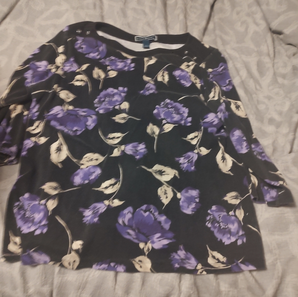A long sleeve shirt. Purple, black and white.